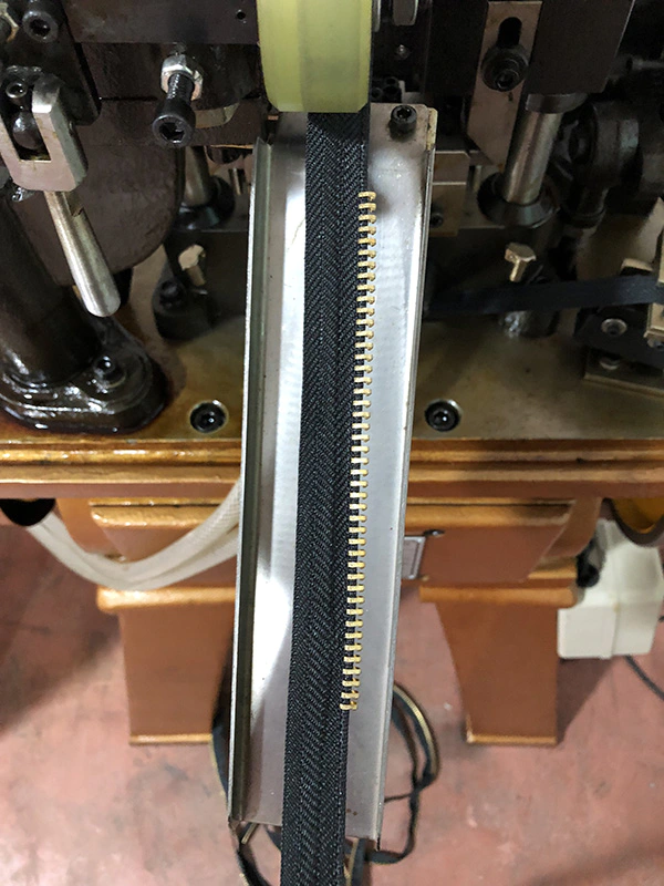 Custom zip machinery factory for zipper production