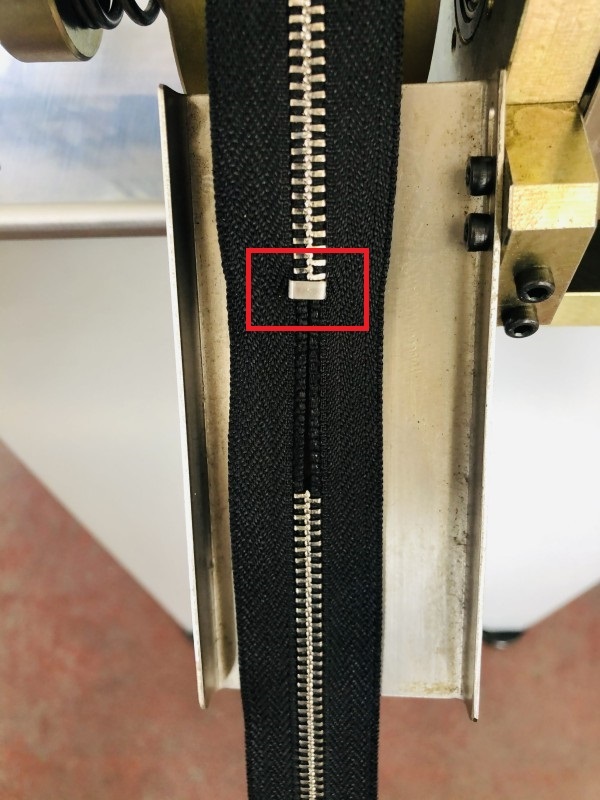 Custom metal zipper bottom stop machine suppliers factory for zipper production