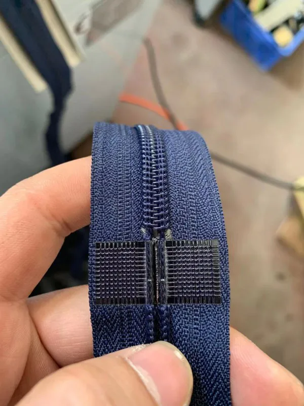 Custom nylon zipper making machine manufacturers for apparel industry